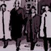 On February 1, 1960 photographer Jack Moebes arrived at F.W. Woolworth  just as the store was closing. A small crowd had gathered to witness the sit-in, but store manager Curley Harris would not allow him to take photographs. He waited until the four students came out of a side entrance, then asked them to pose for him walking down the sidewalk. The photograph was not printed in the Greensboro newspaper, which was not interested in promoting the cause of the protesters, but became famous ten years later at the anniversary. 