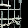 More than 150 women were sentenced to prison as a result of their picketing the White House. The charge of obstructing the sidewalk led to sentences from two to six months at the Occoquan Workhouse. The women demanded to be treated as political prisoners, objecting to poor conditions. With a few of their members placed in solitary confinement, some of the women embarked upon a hunger strike, which resulted in them being force fed by prison officials.  The National Women's Party recognized the travail and heroism of the prisoners.  In December, 1917, at a meeting in their honor, the pickets who had been jailed were presented with small silver pins in the shape of prison doors with heart-shaped locks. The women wore their pins to commemorate their imprisonment and call attention to the injustice of being "jailed for freedom." In 1918 President Wilson pledged to support female suffrage.  Many of the women went on to conduct protests  around the country until the Nineteenth Amendment was passed.